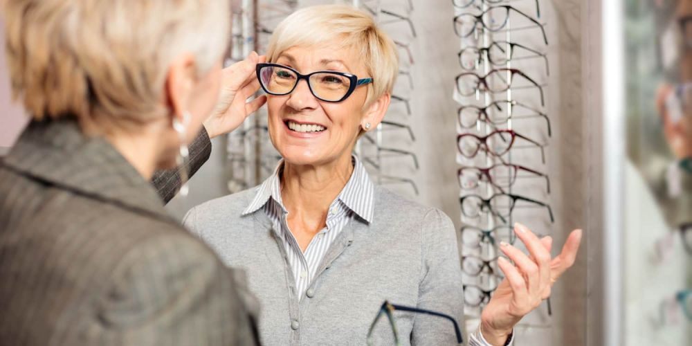 woman trying glasses
